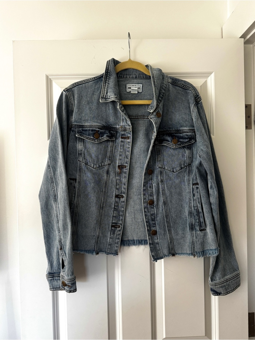 For the Republic Denim, size M/M, a medium-wash denim jacket with a raw/frayed